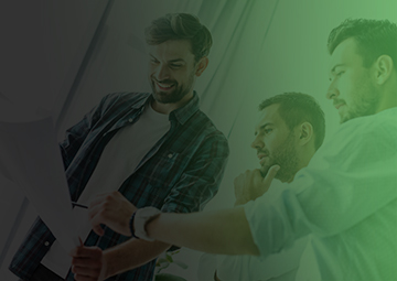 Three men discuss strategies at a table titled 